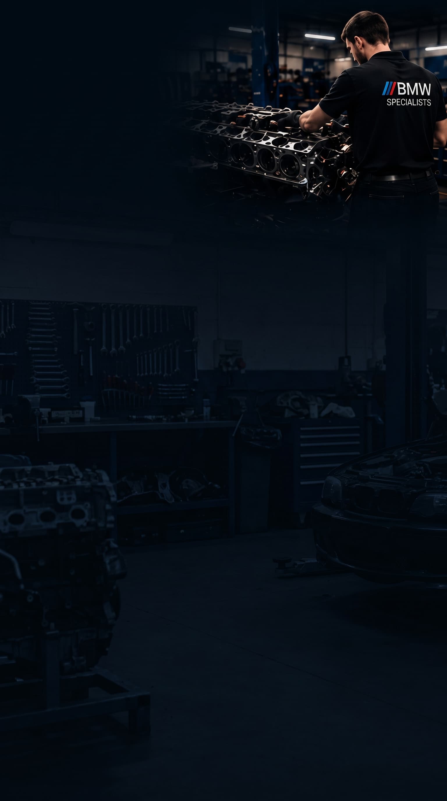 BMW specialist assembling an engine